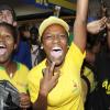 Contributed 
Fans go wild inside the Jamaica National (JN) House at the 60th Denbigh Agricultural, Industrial and Food Show in Clarendon as Usain Bolt blazes across the finish line in the men's 100m final at the London Olympics in an Olympic record of 9.63 seconds. Yohan Blake placed second in 9.75 seconds, while Asafa Powell pulled up with an injury, but crossed the line in 11.99 seconds in eigth position.