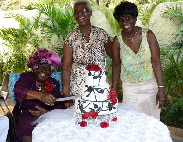 Winston Sill/Freelance Photographer
Centennial Birthday Celebrations for Mildred Adora James, held ay Polyanna Caterers, Stanton Terraceon Sunday June 28, 2015. Here are Mildred Adora James (left) and her two daughters.
Note: Christopher Serju have the names of the two daughters.