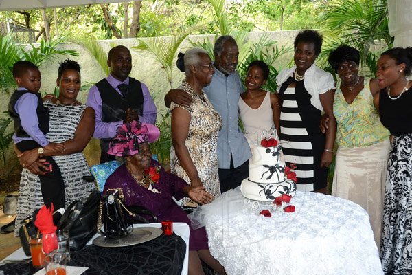 Winston Sill/Freelance Photographer
Centennial Birthday Celebrations for Mildred Adora James, held ay Polyanna Caterers, Stanton Terraceon Sunday June 28, 2015. Here Mildred Adora James (sitting) with her Children, Grand Children, and Great Grand Children.