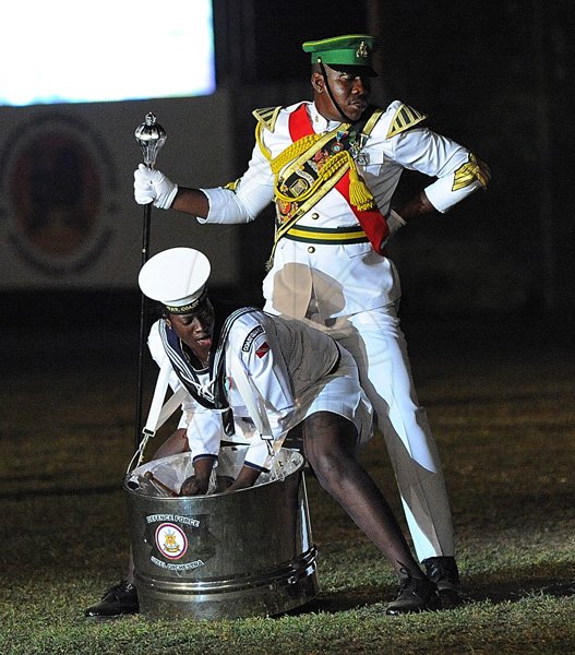 Ian Allen/Photographer
Members of the Trinidad and Tobago Defence Force Steel Band get on bad at the Jamaica Military Tattoo 2012  at Up Park Camp on Thursday June 28.