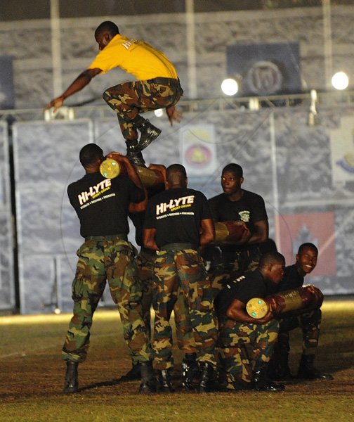 Ian Allen/Photographer
Members of the Jamaica Defence Force show their strength and agility to the delight of the audience at the Jamaica Military Tattoo at Up Park Camp on Thursday June 28.