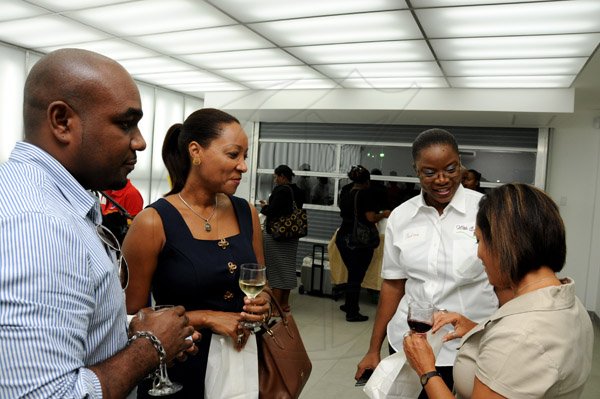 Winston Sill/Freelance Photographer
With Ease Catalogue Jamaica Limited host first Business Mixer Function, held at Audi Showroom, Oxford Road on Friday night August 23, 2013.