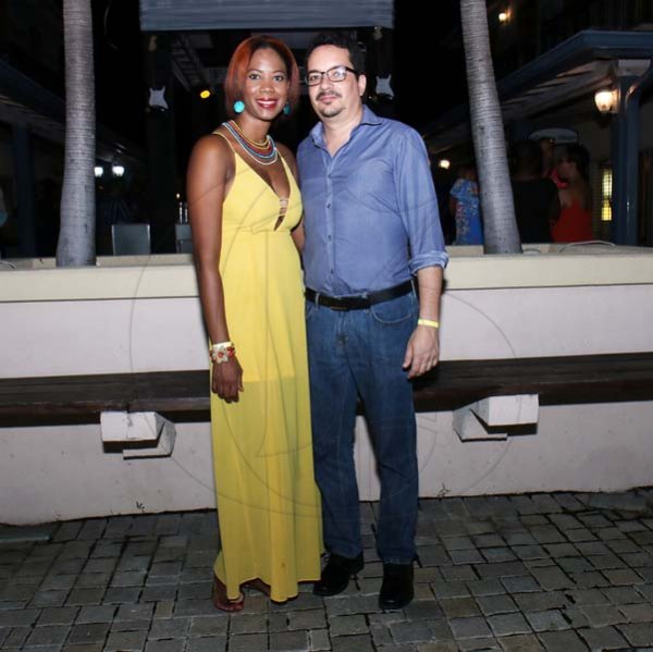 Ashley Anguin<\n>Kerry-Ann Lawrence snapped with Christopher Phillips as they came out to support the Montego Bay Chamber of Commerce and Industry's Food, Fashion and Dance at the Shoppes of Rose Hall in Montego Bay last Saturday.