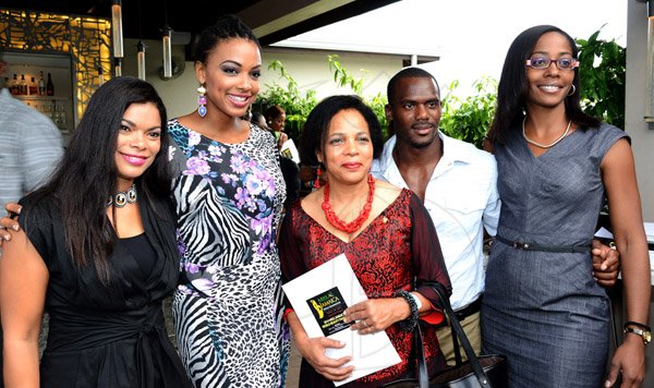 Winston Sill/Freelance Photographer
From left: Laura Butler, Franchise Holder of MJWO and CEO of Fusion Consulting Limited, Former Miss Jamaica World Regina Beavers, UNAIDS Country Director Kate Springs, Athlete Nesta Carter and Ayisha Richards Also a former Miss Jamaica World poses for the camera at The Official Launch of Miss Jamaica World 2014 Beauty Pageant.