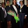 Winston Sill/Freelance Photographer
Miss Jamaica World 2013 and Miss World Caribbean Gina Hargitay return from Miss World Contest, at Norman Manley International Airport on Monday October 14, 2013. Here are Sidney Bartley (left), of the Ministry of Youth and Culture;  Grace Morrison (second left), Marketing and Corporate Communications Manager, Airports Authority of Jamaica; Gina Hargitay (centre); Andrea Francis (second right); and Laura Butler (right).