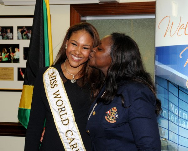 Winston Sill/Freelance Photographer
Miss Jamaica World 2013 and Miss World Caribbean Gina Hargitay return from Miss World Contest, at Norman Manley International Airport on Monday October 14, 2013. Here are Gina Hargitay (left) and mom Marlene Hargitay (right).