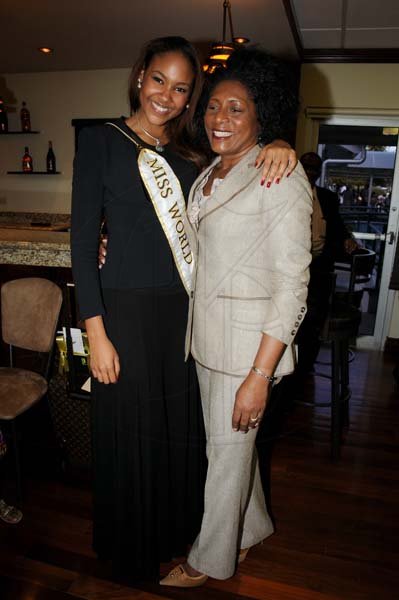 Winston Sill/Freelance Photographer
Miss Jamaica World 2013 and Miss World Caribbean Gina Hargitay return from Miss World Contest, at Norman Manley International Airport on Monday October 14, 2013. Here are Gina Hargitay (left); and Dawn Henry (right).