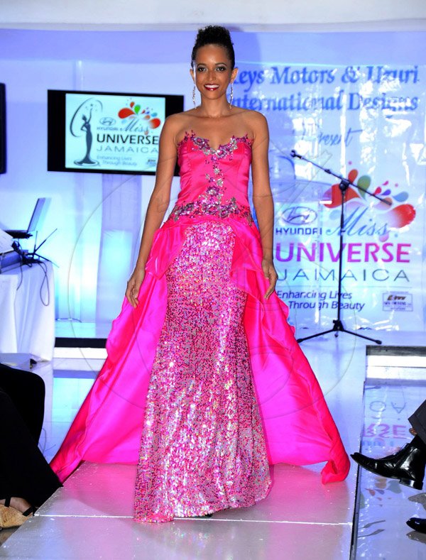 Winston Sill/Freelance Photographer
Miss Universe Jamaica 2014 Kingston Launch, held at the Spanish Court Hotel, St. Lucia Avenue, New Kingston on Monday night June 16, 2014.

Preview of Uzuri's International new evening wear collection:
This pretty in pink elegant dress was given a touch of glitz and glam making it a piece no woman would deny their closets.