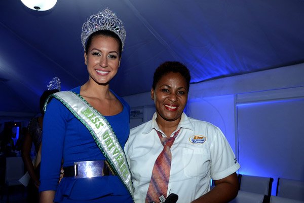 Winston Sill/Freelance Photographer
Miss Universe Jamaica 2014 Kingston Launch, held at the Spanish Court Hotel, St. Lucia Avenue, New Kingston on Monday night June 16, 2014. Here are Kerrie Bayliss (left); and Raquel Chin (right), Sales Consultant, Key Motors Limited.