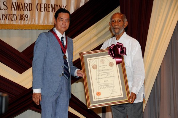 Winston Sill/Freelance Photographer
The Institute of Jamaica (IOJ) presents the Musgrave Medals Award Ceremony, held at The Institute's Complex, East Street, Kingston on Wednesday October 16, 2013. Here are Dr. Trevor Yee (left), Bronze Awardee; and Prof. Sir Fitzroy Augier (right), Fellow, IOJ.