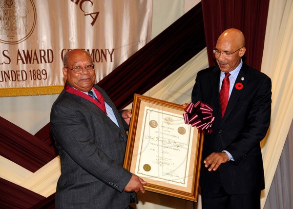 Winston Sill/Freelance Photographer
The Institute of Jamaica (IOJ) presents the Musgrave Medals Award Ceremony, held at The Institute's Complex, East Street, Kingston on Wednesday October 16, 2013. Here are Prof. Franklin W. Knight (left), Gold Awardee; and Governor General Sir. Patrick Allen (right).