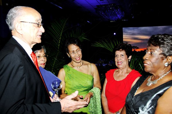 Winston Sill / Freelance Photographer
National Commercial Bank (NCB) 5th annual Nation Builder Wards Gala, held at the Jamaica Pegasus Hotel, New Kingston on Sunday night November 18, 2012. Here are Mike Fennell (left); Peggy Fennell (second left); Joey James (centre); Marguerite Banks (second right); and Irene Walters (right).