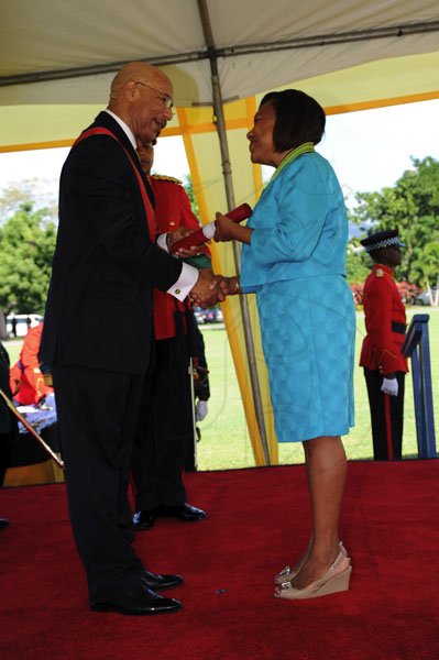 Ricardo Makyn/Staff Photographer
Ceremony of investiture and presentation of National Honours and awards 2012 at Kings House on Monday 15.10.2012