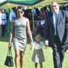 Jermaine Barnaby/Photographer
Audley Shaw (right) making his way to the awardees tent with his family in tow Susan Shaw and daughter Kristiana Shaw on heroes Day where he was honoured during a ceremony at Kings House on Monday October 21, 2013.