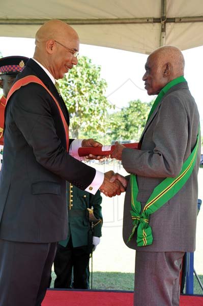 Jermaine Barnaby/Photographer

Reverend Dr. Garnet Brown was awarded membership in the Order of Jamaica for exceptional and exemplary service to agriculture at the National Honours and Awards Ceremony