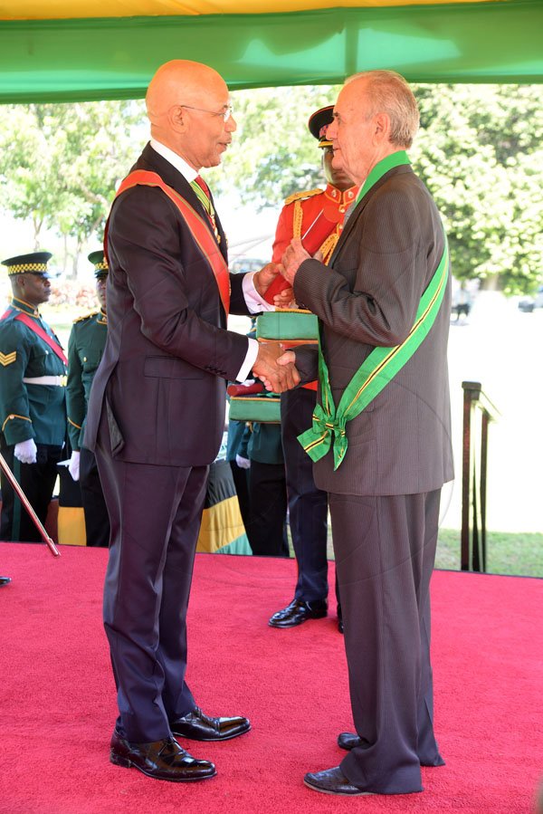 Lionel Rookwood/PhotographerAnthony Keith Edmund Hart CD recieves The Order Of Jamaica from Governor General Sir Patrick Allen at The National Awards held at King's House on Monday October16,2017.
