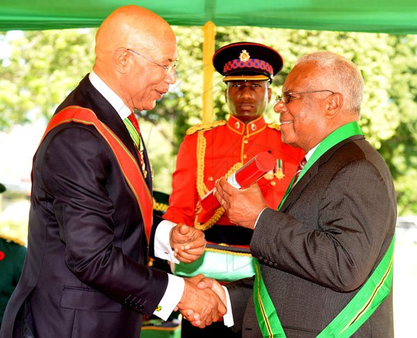 Lionel Rookwood/PhotographerAmbassador Clifton George Whyms Stone CD recieves The Order Of Jamaica from Governor General Sir Patrick Allen at The National Awards held at King's House on Monday October16,2017.