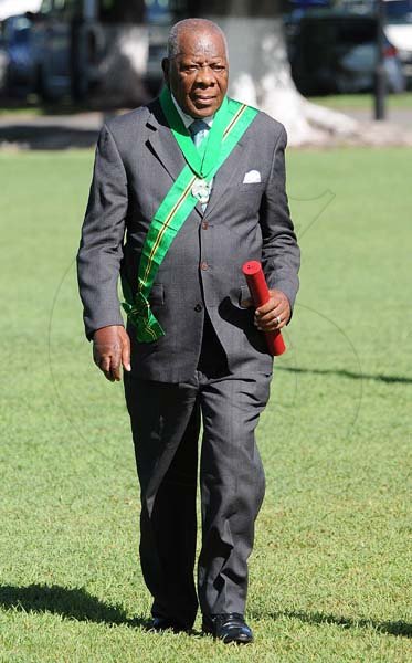 Lionel Rookwood/PhotographerGodfrey Dyer walks back after recieving The Order of Jamaica during the National Awards and Honours held at King's House on October15th,2018