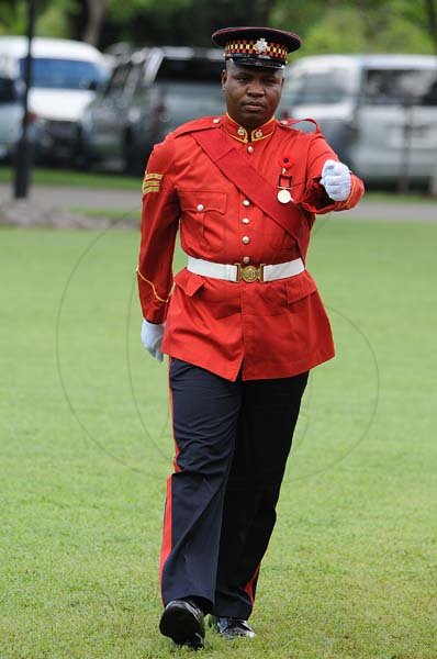 Lionel Rookwood/PhotographerCpl.Omar Seymour walks back after being presented the Badge of Honour for Gallantry at the Presentation of National Honours and Awards held at King's House on October 15th,2018.