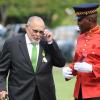 Lionel Rookwood/PhotographerHerbert Ziadie is escorted by a JDF soldier after being awarded the Order of Distinction in the rank of officer at the Presentation of National Honours and Awards held at King's House on October 15th,2018.