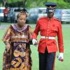 Lionel Rookwood/PhotographerGrace Allen is escorted by a JDF soldier after being presented the Badge of Honour for Gallantry at the Presentation of National Honours and Awards held at King's House on October 15th,2018.