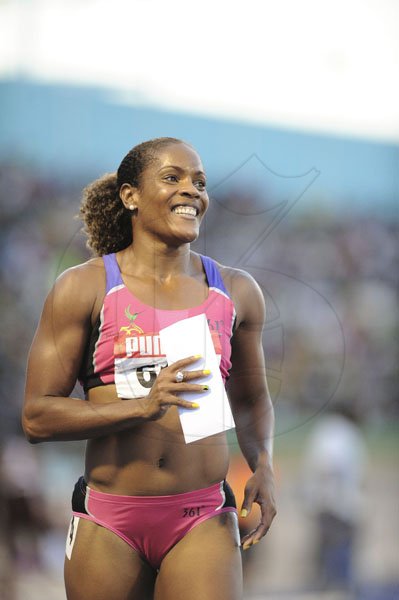 Ricardo Makyn/Staff Photographer
Brigitte Foster-Hylton reacts after winning the women's 100 metres hurdles final at the JAAA/Supreme Ventures National Senior Track and Field Athletics Championships at the National Stadium on Sunday night.