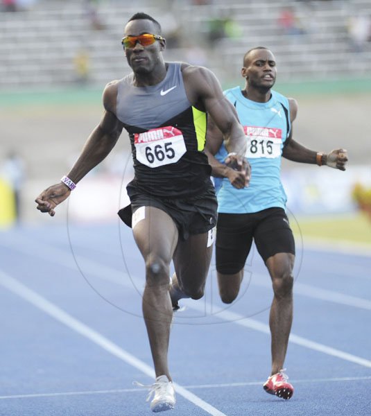Ricardo Makyn/Staff Photographer
Dae Hyatt runs to win the men's 400 metres final at the JAAA/Supreme Ventures National Senior Track and Field Athletics Championships at the National Stadium on Sunday.