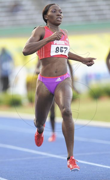 Ricardo Makyn/Staff Photographer
Novelette Williams-Mills wins the women's 400 metres final at the JAAA/Supreme Ventures National Senior Track and Field Athletics Championships at the National Stadium on Sunday night.