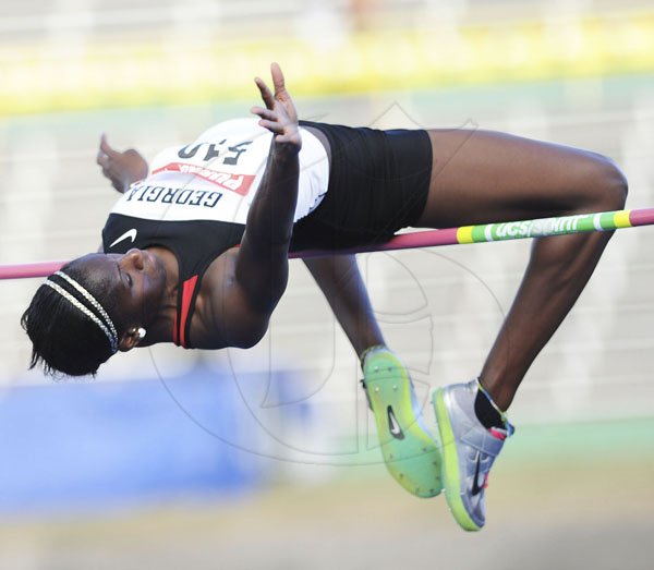 Ricardo Makyn/Staff Photographer
Saniel Grier-Atkinson clears the bar on the way to winning the women's high jump final at the JAAA/Supreme Ventures National Senior Track and Field Athletics Championships at the National Stadium on Sunday.