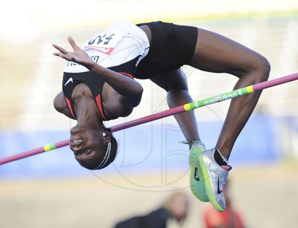 Ricardo Makyn/Staff Photographer
Saniel Grier-Atkinson clears the bar on the way to winning the women's high jump final at the JAAA/Supreme Ventures National Senior Track and Field Athletics Championships at the National Stadium on Sunday.