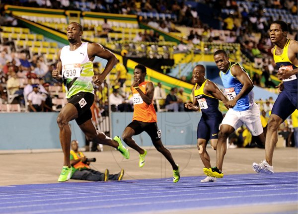 Usain Bolt winning heat one in the mens quarter finals