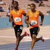 Kemar Bailey-Cole runs with Yohan Blake in Heat two of the Mens 100
Quarter Finals