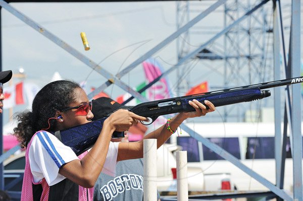 Ian Allen/Staff Photographer
Alysia Evras during the Junior Clay Shooting Tournament in Portmore St.Catherine on Sunday.