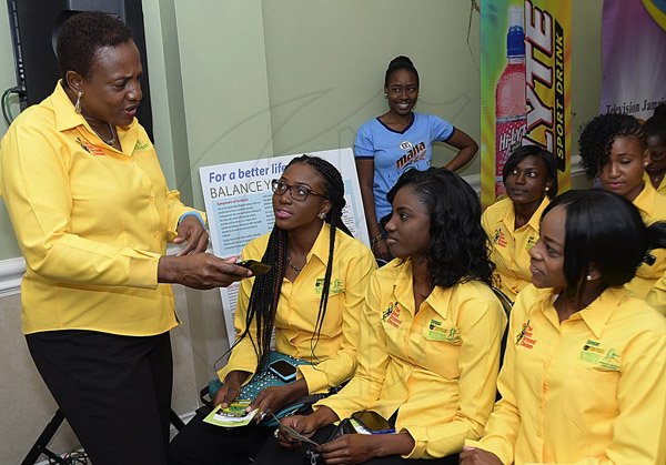 Ian Allen/Photographer
Maureen Hall, High Performance director of the Jamaica Netball Association (left) talks to members from (right) Patricia McCalla, Malysha Kelly and Sasha-Gay Lynch during the launch of the Supreme Ventures Sunshine Series at the Courtleigh hotel yesterday.