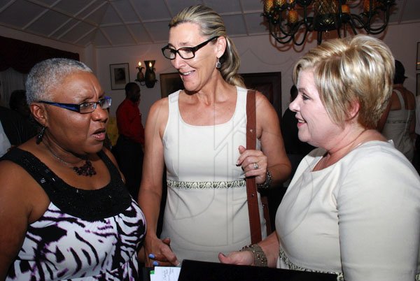 Colin Hamilton/Freelance Photographer
Team Reception for the Sunshine Series 2012 at the Hotel Four Seasons on June 13, 2012.
From left, President of the Jamaica Netball Association Marva Bernard chats with Coach Elize Kotze and Representative from Netball South Africa Ms. Christine du Preez.