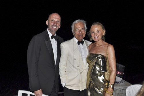 Janet SilveraPhoto
Their is no doubt that Jamaica is the place to be to ring in a new year.  Renowned American fashion designer Ralph Lauren (centre) certainly thinks so as he rang in the New Year with his wife Ricky, at  the fabulous Round Hill Hotel and Villas with the resort's managing director, Joseph Fortsmayr last Saturday night.