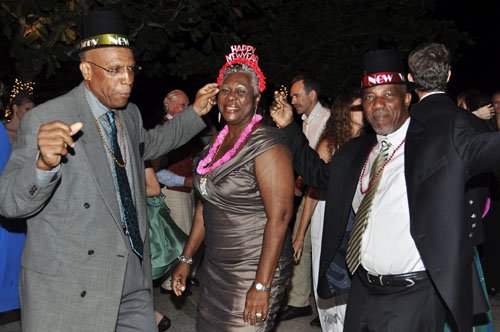Janet Silvera Photo
 
From Left: Noel Taylor, Jasmine Tomlinson-Brown and husband Owen ringing in the New Year at the Round Hill Hotel and Villas in Hanover.


******************************************************************************************** last Saturday night.