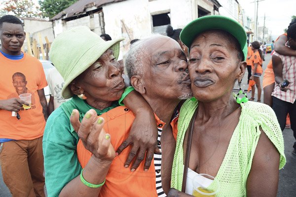Rudolph Brown/Photographer<\n>PNP and JLP supporters party after nomination on West and Beeston Street in West Kingston on Nomination Day on Tuesday, February 9, 2016<\n>