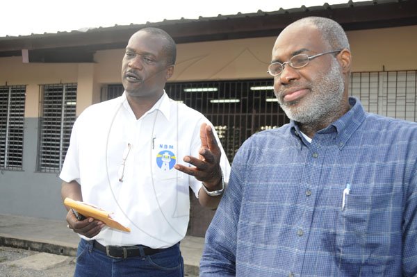 Gladstone Taylor/Staff Photographer
Nomination Day
North West St. Andrew
Curtis Campbell (right), NDM and Peter Townsend