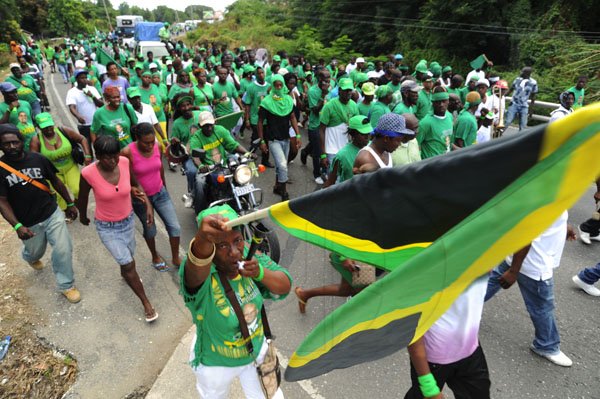 Ricardo Makyn/Staff Photographer
JLP supporters in Yallahs  Western St Thomas on Nomination Day on Monday 12.12.2011