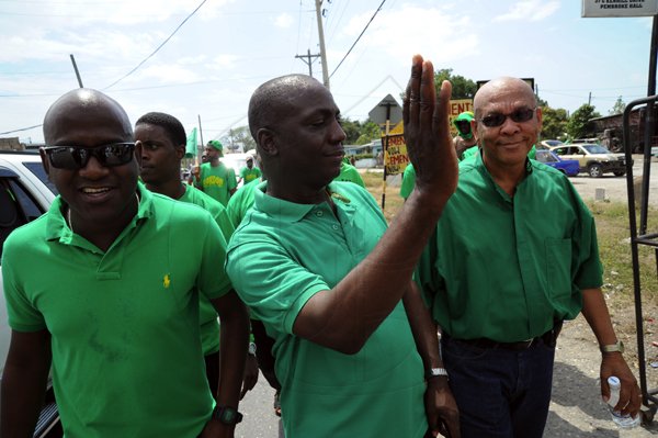 Norman Grindley / Chief Photographer
Jamaica Labour party (JLP) candidates Dwayne Smith, (left) Audley Gordon, (centre) and vernon McLoud, heading to the Pembroke Hall nomination centre in St. Andrew yesterday.