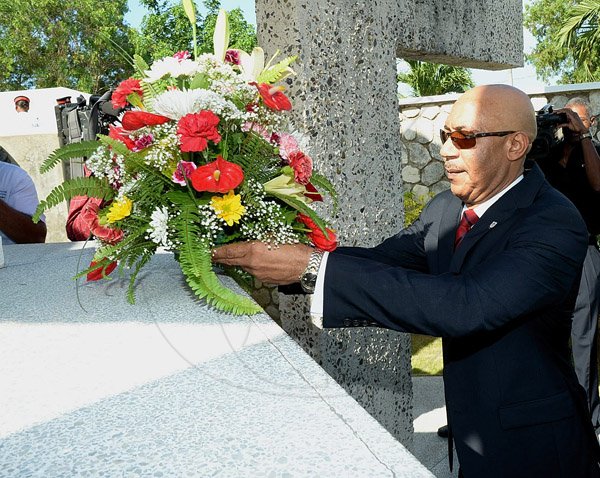 Ian Allen/Staff Photographer
Sir Patrick Allen, Governor General, lay a wreath during the Floral Tribute in honour of Norman Manley at National Heroes Park Commemorating the 120th Anniversary of his birth.