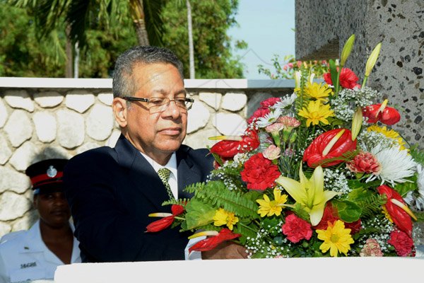 Ian Allen/Staff Photographer
Dr.Kenneth Baugh representing the Leader of the Opposition lays a wreath during the Floral Tribute in honour of Norman Manley at National Heroes Park Commemorating the 120th Anniversary of his birth.