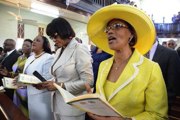 Rudolph Brown/Photographer
From left Olivia Grange, Natalie Neita Headley, Prime Minister Portia Simpson Miller and Sonia Fuller at the Service of thanksgiving for the 140th Anniversary of the City of Kingston and The Achievements of the London 2012 Olympians and Paralympians " Repairing the Breach, Restoring the Treasure" at the East Queen Street Baptist Church on East Queen Street in Kingston on Sunday, October 14, 2012