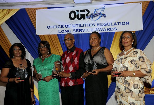 Winston Sill / Freelance Photographer
Office of Utilities Regulation (OUR) 15th Anniversary and Long Service Awards Gala Dinner, held at Mona Visitor's Lodge, UWI, Mona on Wednesday night December 19, 2012. Here are the 15 year awardees.