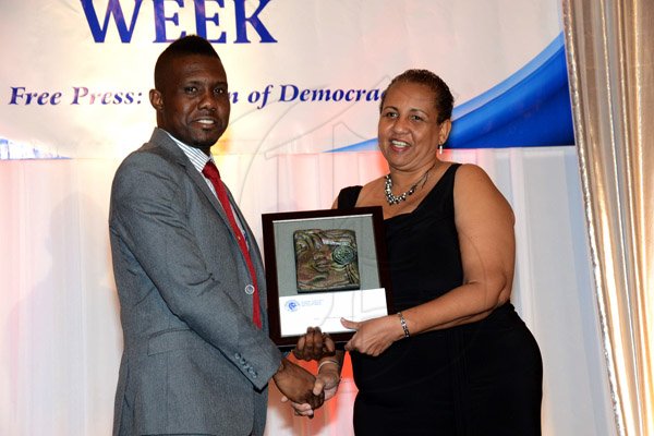 Winston Sill/Freelance Photographer
The Press Association of Jamaica (PAJ) annual National Journaism Awaeds Banquet, held at the Jamaica Pegasus Hotel, New Kingston on Friday night November 28, 2014. Here are Andre Lowe (left); and Greta Bouges (right).
