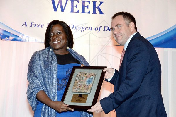 Winston Sill/Freelance Photographer
The Press Association of Jamaica (PAJ) annual National Journaism Awaeds Banquet, held at the Jamaica Pegasus Hotel, New Kingston on Friday night November 28, 2014. Here are Ingrid Brown (left); and EU representative??.