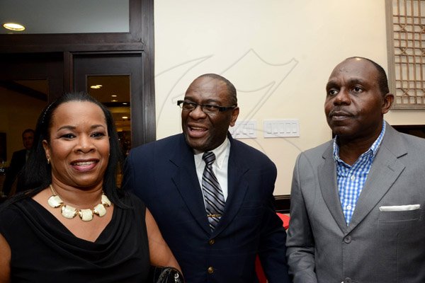 Winston Sill/Freelance Photographer
The Press Association of Jamaica (PAJ) annual National Journaism Awaeds Banquet, held at the Jamaica Pegasus Hotel, New Kingston on Friday night November 28, 2014. Here are ---????? (left, Buzz Magazine; Dwight Moore (centre); and Kenarthur Mitchell (right).