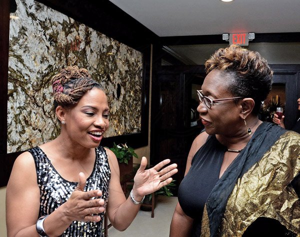 Winston Sill/Freelance Photographer
The Press Association of Jamaica (PAJ) annual National Journaism Awaeds Banquet, held at the Jamaica Pegasus Hotel, New Kingston on Friday night November 28, 2014. Here are Dionne Jackson Miller (left); and DPP Paula Llewellyn (right).
