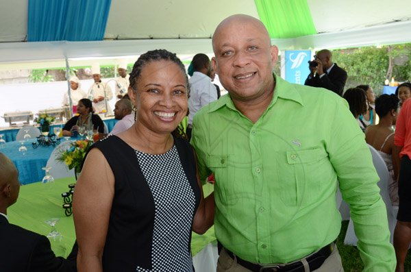 Rudolph Brown/ Photographer
Dionne Jackson Miller, President of PAJ pose with Mark Chisholm, Vice President individual Line sales at the PAJ President's brunch at the Pegasus Hotel on Sunday, November 23, 2014